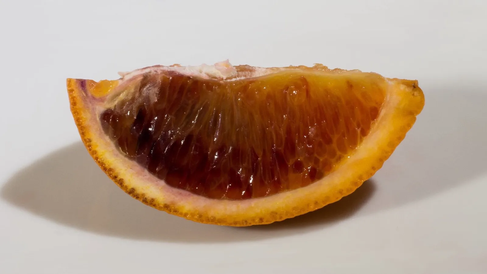 Fruit cut into pieces, where equivalence is understood before it is written.