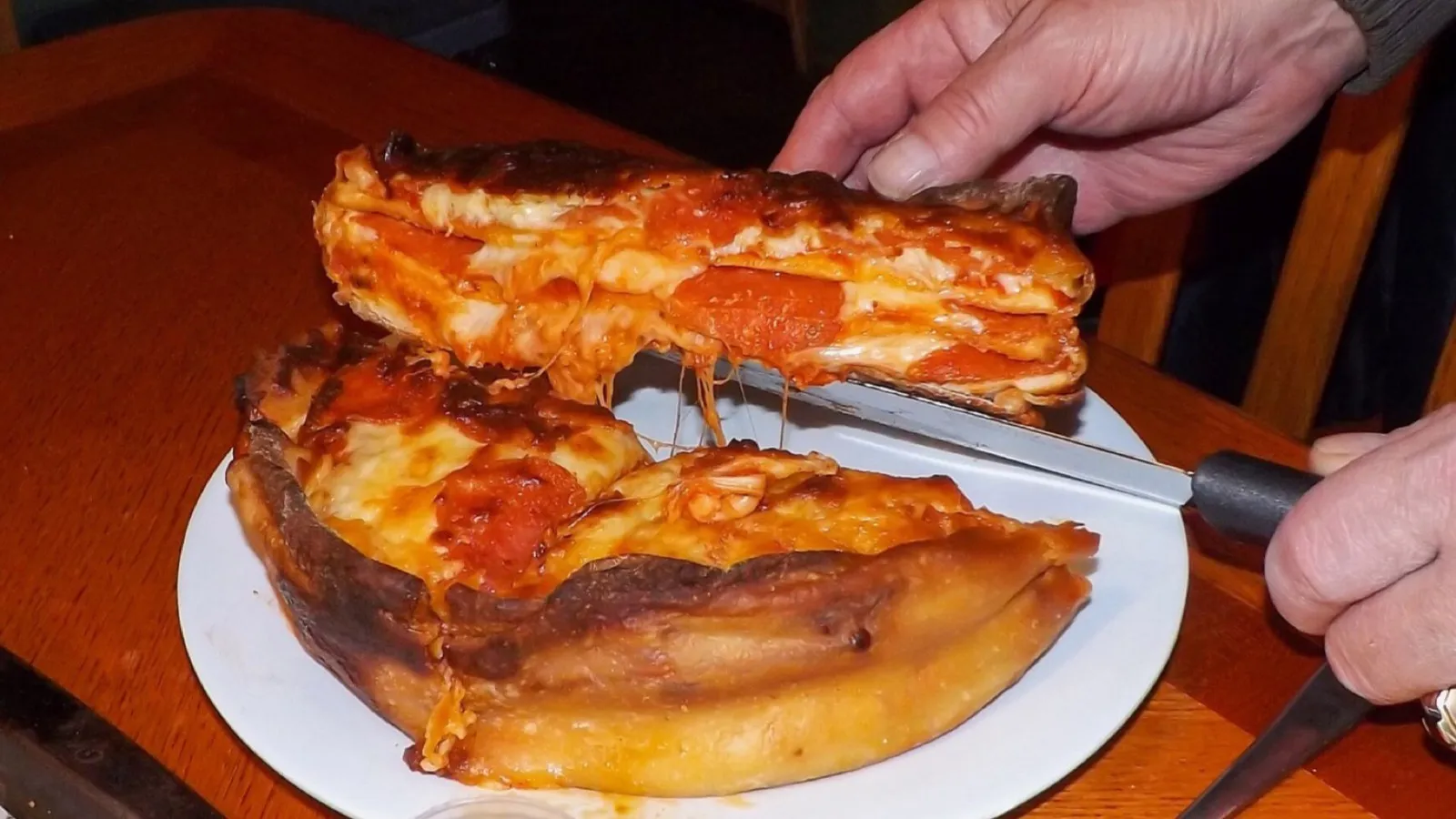 A round flatbread cut into equal slices, which is what the bottom number of a fraction counts. Photo: Crisco 1492, CC BY-SA 4.0, via Wikimedia Commons.
